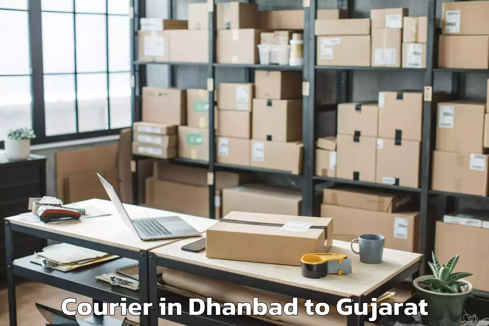 Easy Dhanbad to Navrangpura Courier Booking